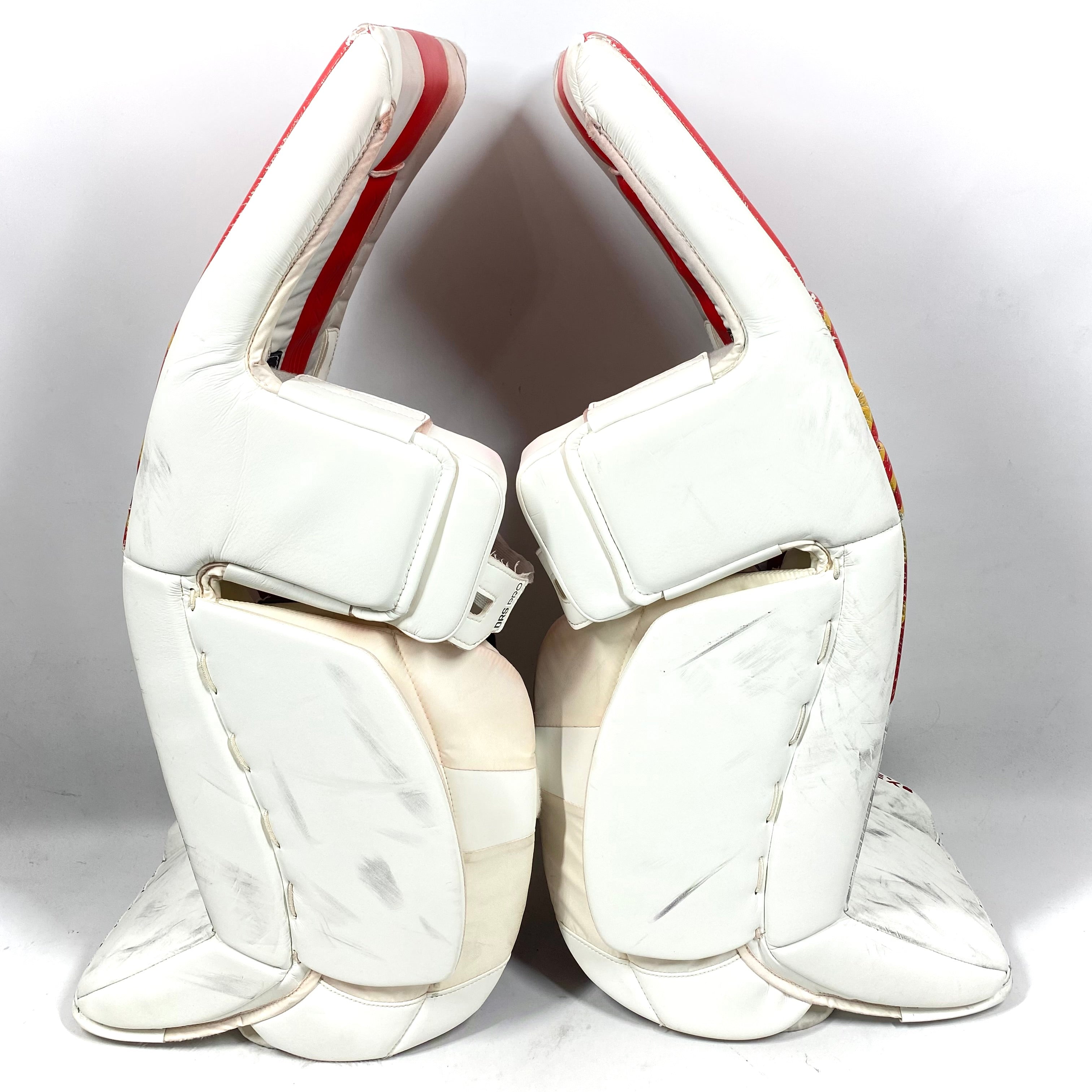 CCM Extreme Flex 6 - Jambières de gardien de but Pro Stock d'occasion (blanc/rouge/jaune)
